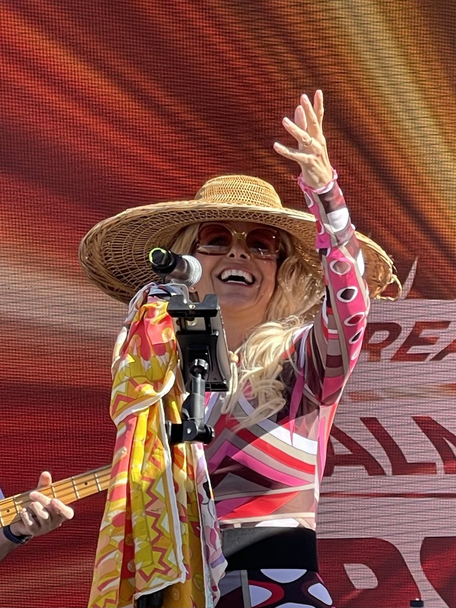 Christine Tringali-Nunes singing on stage